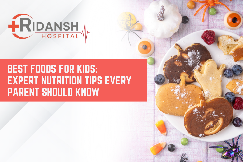 Ridansh Hospital banner on best foods for kids featuring a colorful plate of fun-shaped pancakes, fresh berries, and healthy snacks for children.